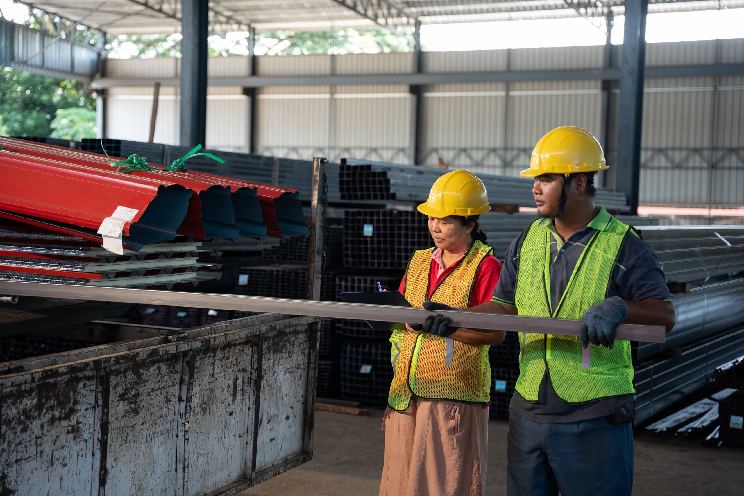 Yong Hsin Metal sales and engineering team advising on a steel order